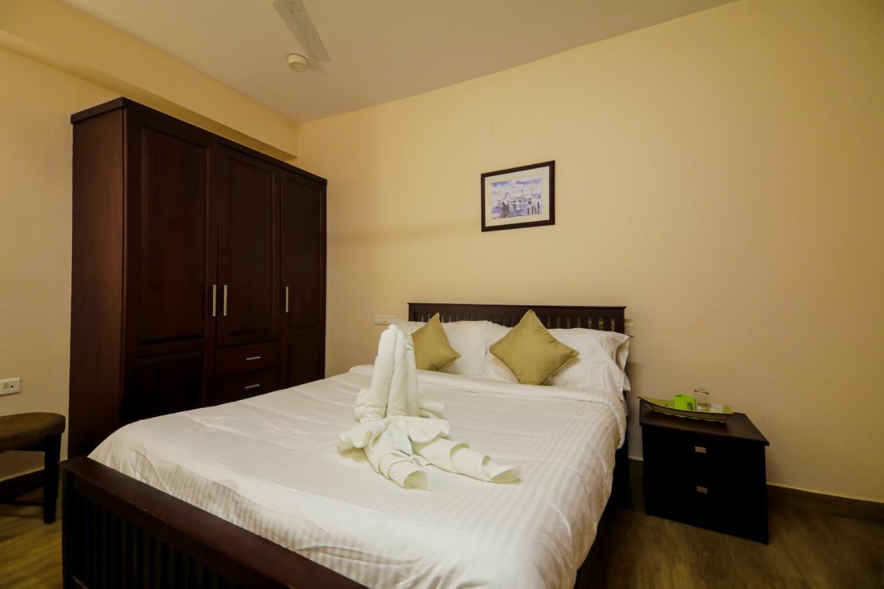 Misty Rosa Luxury Serviced Apartments Kottayam Luaran gambar